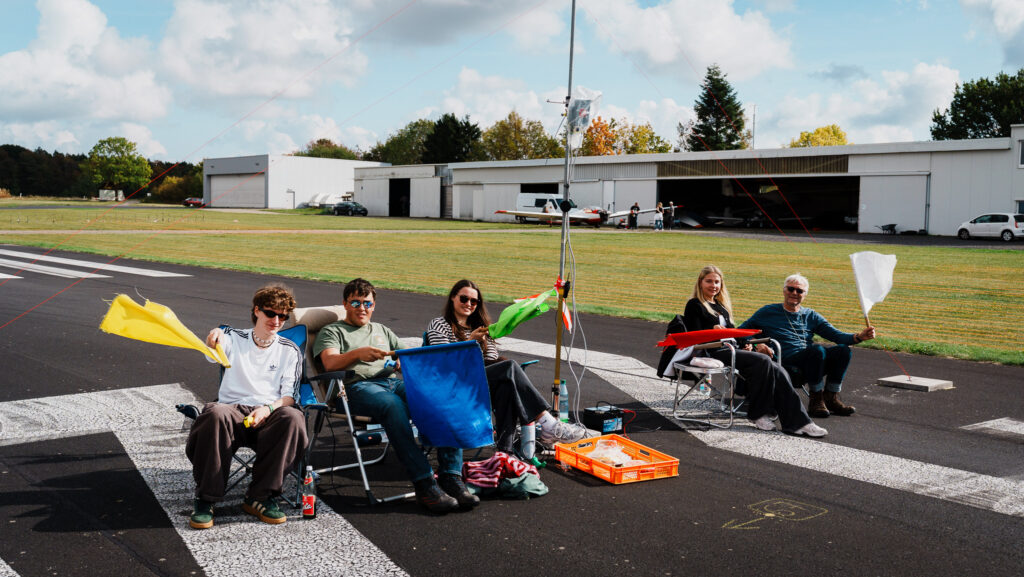 Helpers of a F3B Competition on Base B, Young and old people working together for the sports