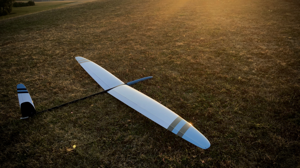 RC-Glider on grass in warm sunset light
